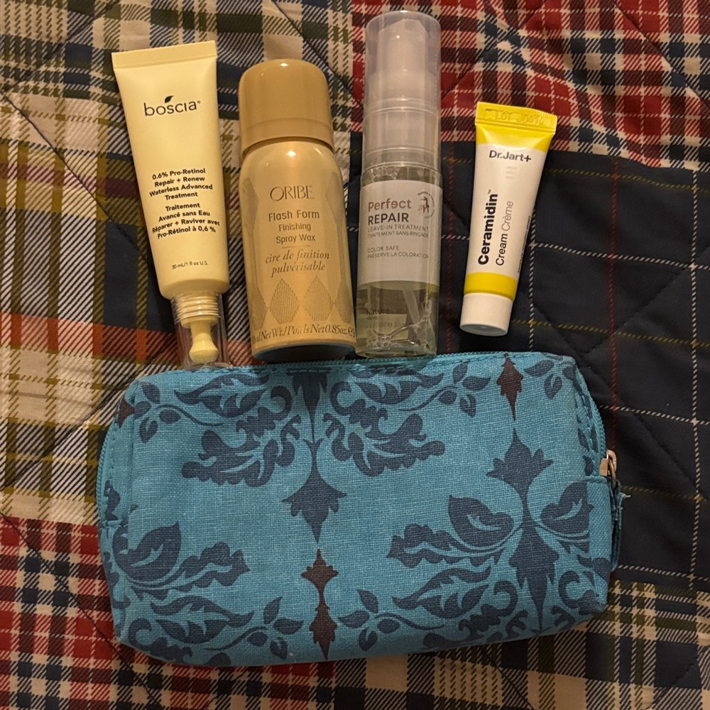 Cosmetic bag with assorted beauty box items